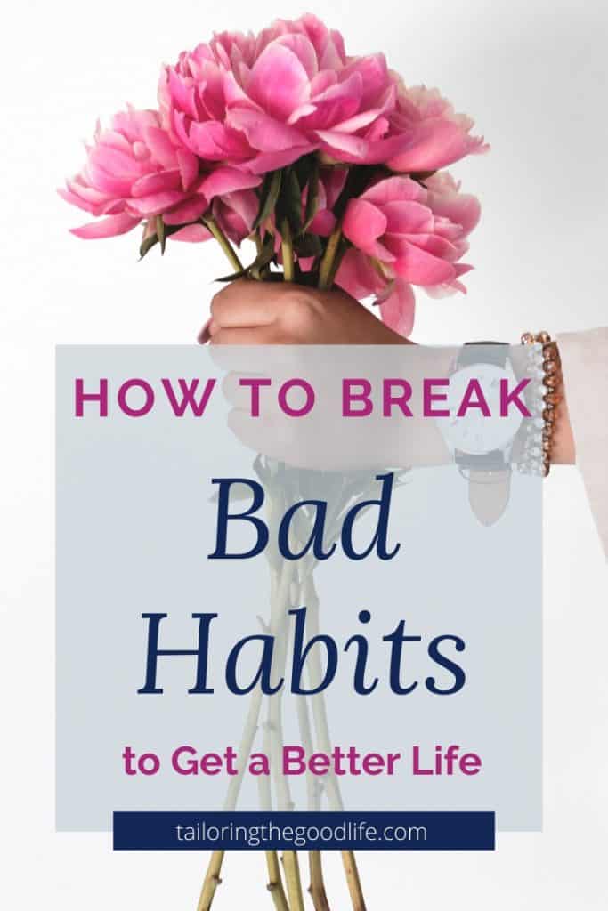 how to break bad habits - woman's hand holding flowers