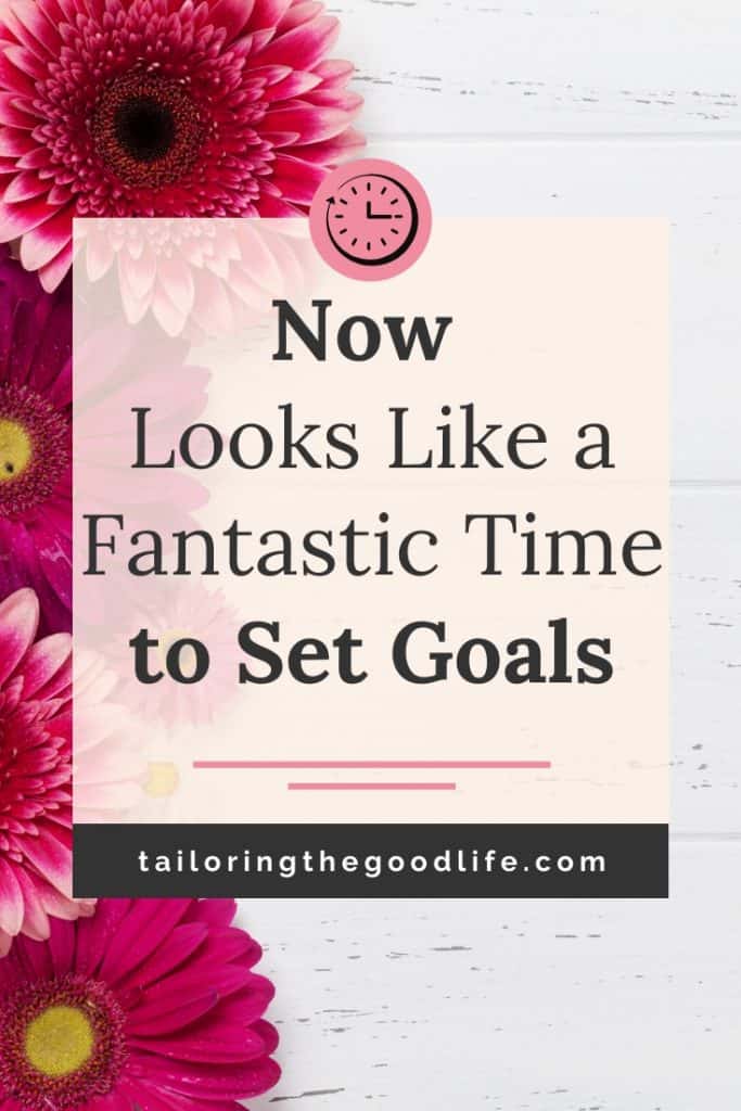 Time to Set Goals - Pink Flowers on a white desk