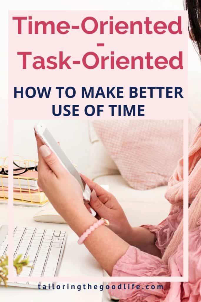 Time-oriented vs Task-oriented - woman looking at her phone while sitting behind her desk in front of the computer